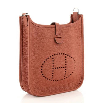 HERME?S CLEMENCE MINI EVELYN TPM CROSSBODY BAG IN ROUGE PIVOINE